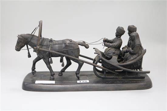 A Russian metal Troika, signed